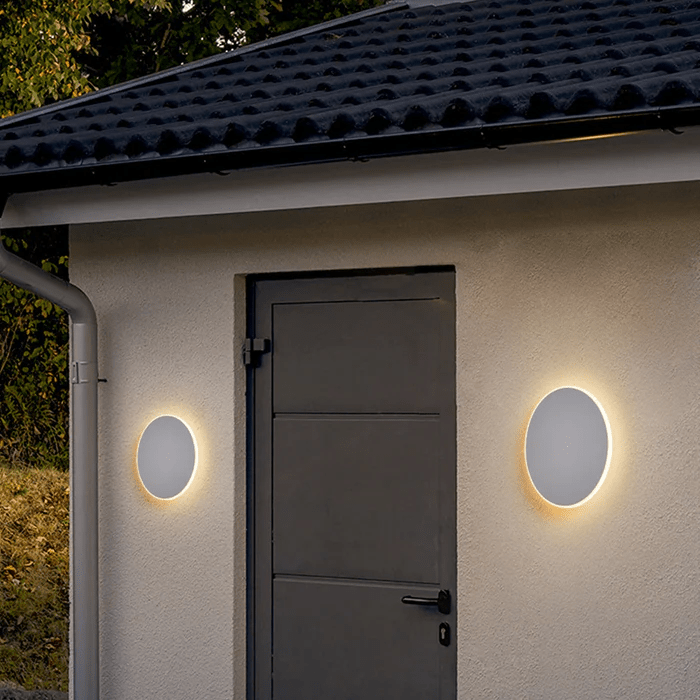 Minimalist Round LED Wall Light Made of Metal for Outdoor Use